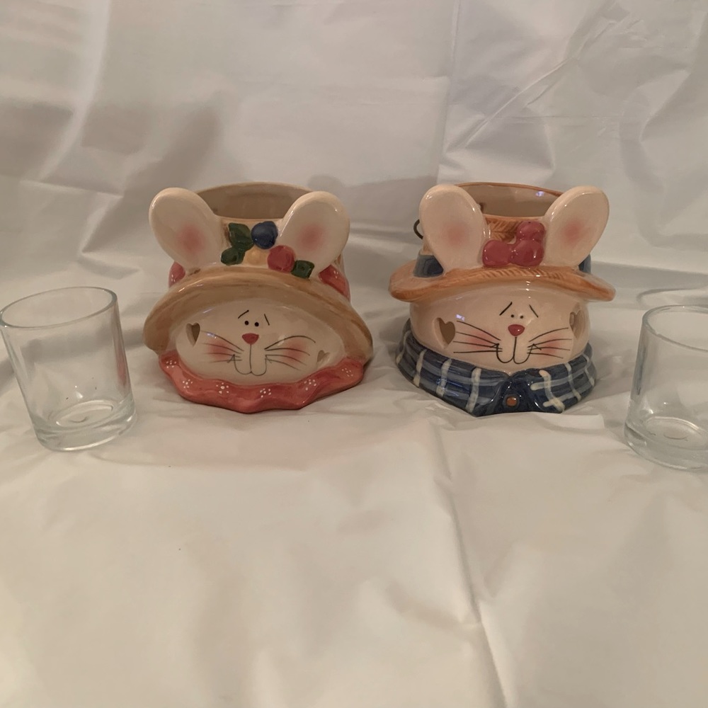Two ceramic bunny candle holders or vase.
